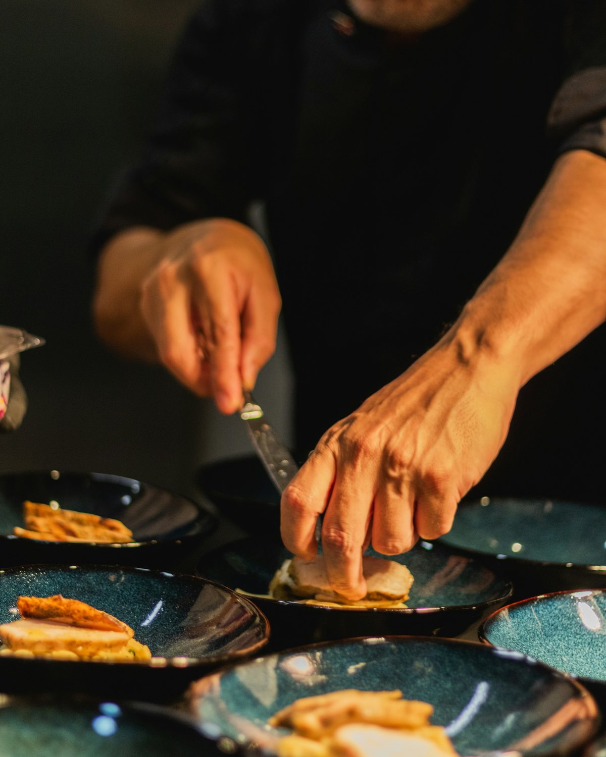 Plating, several hands at work