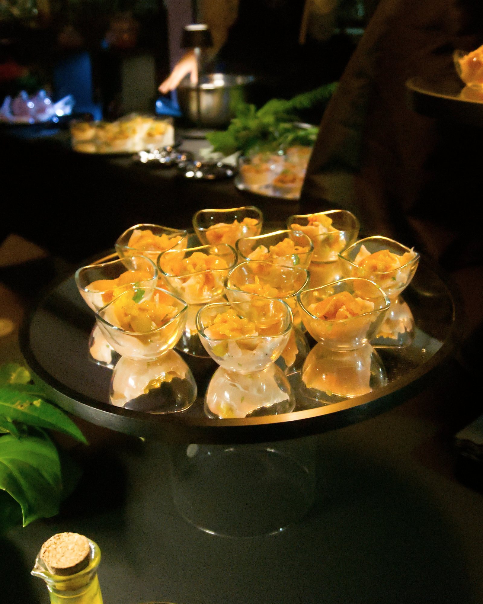Verrines on their mirrored stand at a cocktail reception by the Brigade